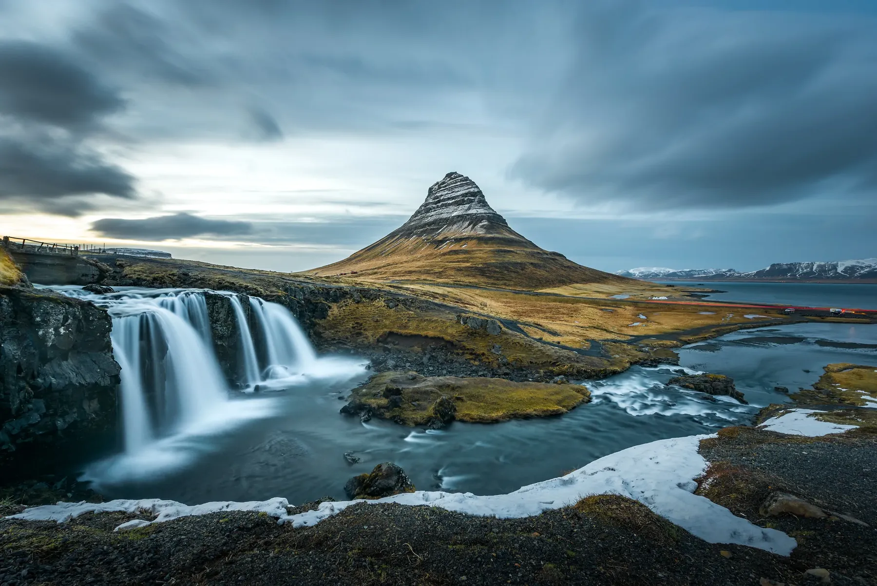 Kirkjufell mountain above its waterfalls